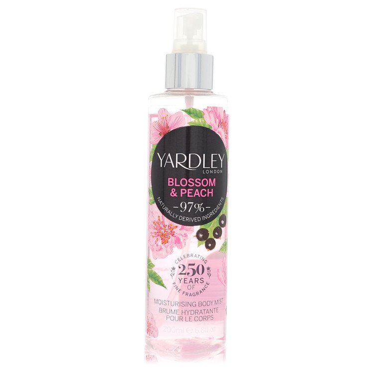 A pink and white body mist bottle with a floral design in a soft pink background by Yardley London.