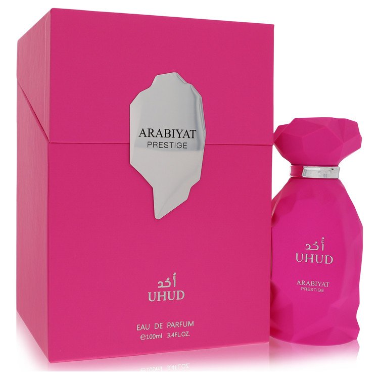 Dark blue bottle of Arabiyat Prestige Uhud Eau De Parfum Spray 3.4 oz unisex perfume by The Fragrance Avenue.