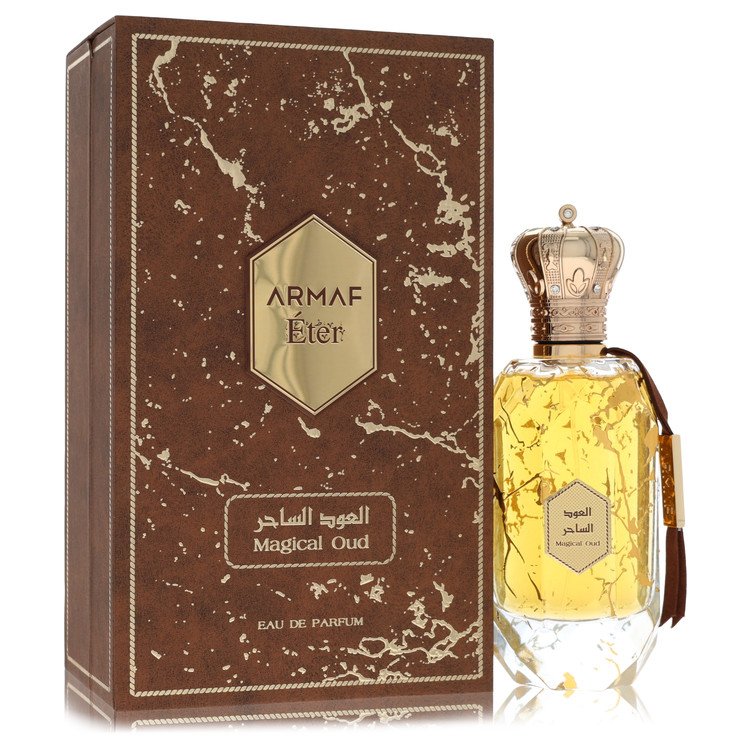 A dark glass bottle with gold accents and a black cap, labeled Armaf Eter Magical Oud Eau De Parfum Spray 3.4 oz / 100 ml for