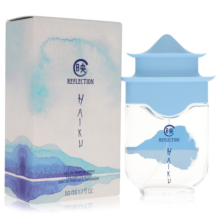 A blue and gold perfume bottle with a minimalist design, labeled Avon Haiku Reflection Eau de Parfum 1.7 oz by The Fragrance 