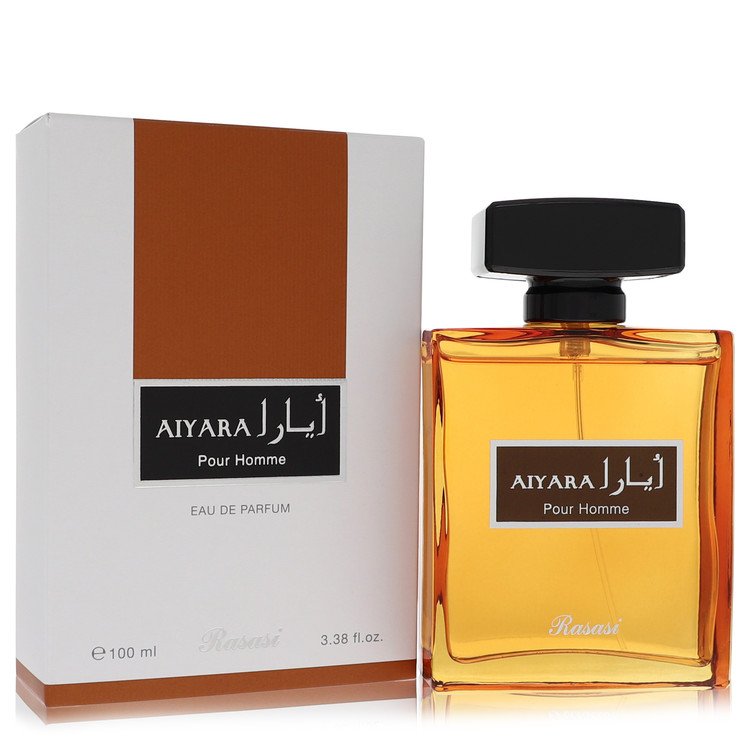 Blue glass bottle of Rasasi Aiyara Eau De Parfum Spray 3.38 oz for men on a wooden surface by The Fragrance Avenue.