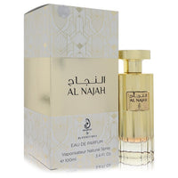 A clear glass bottle with gold accents and a white label reading "Arabiyat Al Najah" by The Fragrance Avenue.