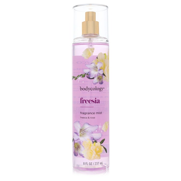 A clear glass bottle of Bodycology Freesia Fragrance Mist Spray for Women with a white label and floral design, 8 oz (237 ml)
