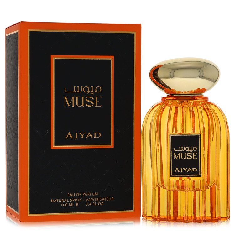 A glass perfume bottle with gold accents and a white label featuring the name Ajyad Muse on a neutral background by The Fragr