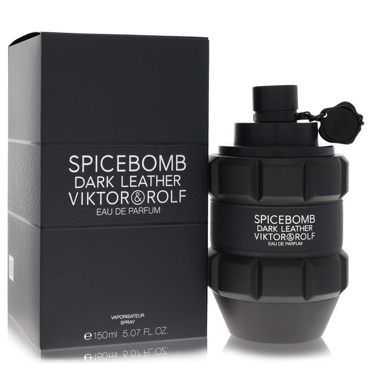 Dark leather fragrance bottle with gold accents, standing on a white surface, labeled Viktor & Rolf Spicebomb Dark Leather Ea