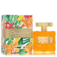 Oscar de la Renta Oscar Bella Soleil Eau de Parfum Spray in gold bottle with floral design on white background by The Fragran