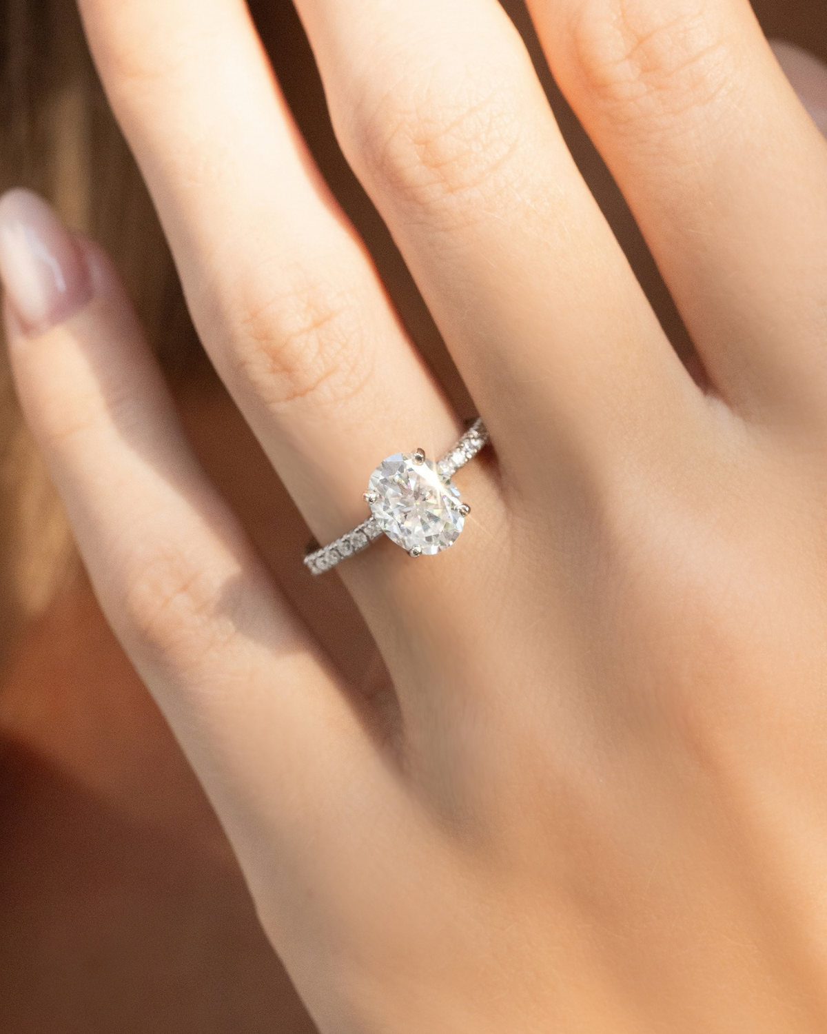 2 ct Oval Solitaire Moissanite Engagement Ring with Pavé Band in Sterling Silver - SJR London Timepiece