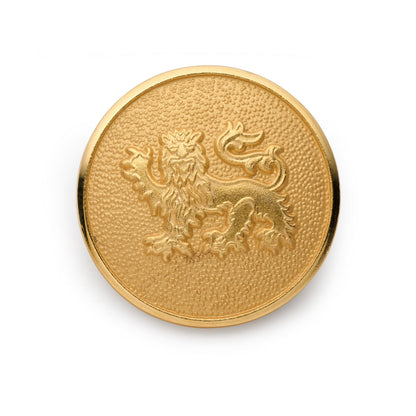 A gold-toned lion passant guardant blazer button with a detailed engraving, shown against a dark background, by Benson & Cleg