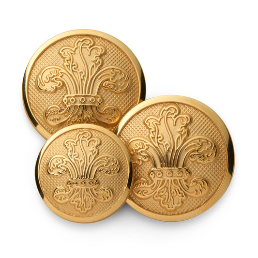 Gold Fleur De Lys blazer button set displayed on a black background with detailed engravings by Benson & Clegg.