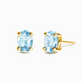 Boucles d'oreilles clous ovales en topaze bleue en vermeil d'or 18 carats