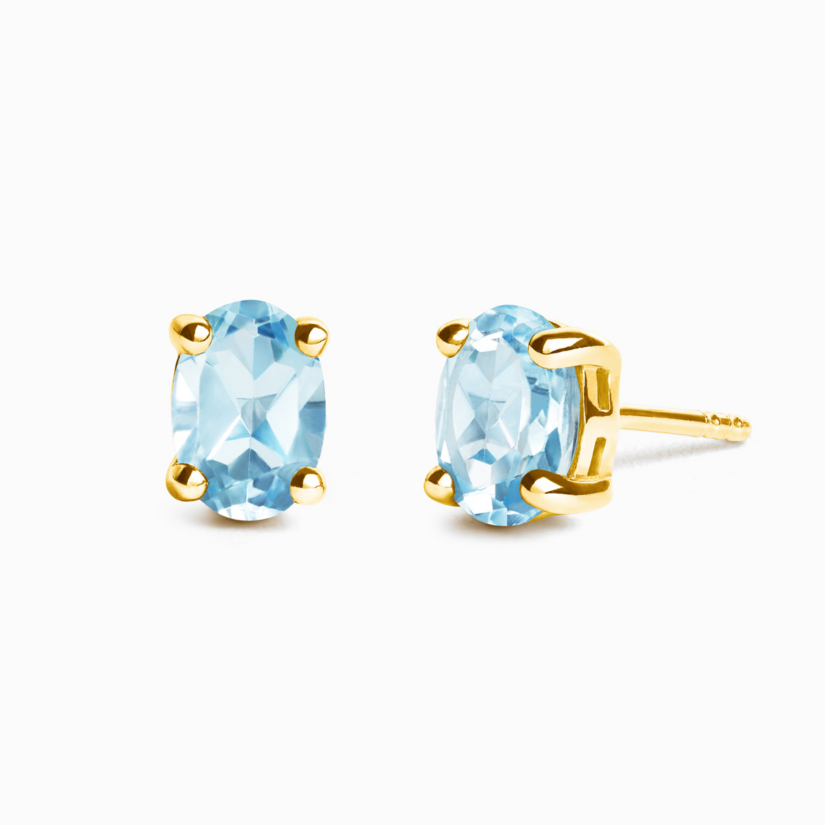 Boucles d'oreilles clous ovales en topaze bleue en vermeil d'or 18 carats