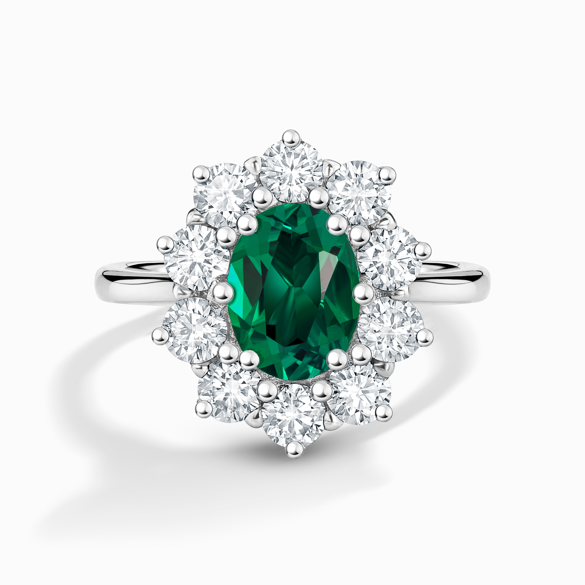 Bague de fiançailles auréole d'émeraudes en argent sterling