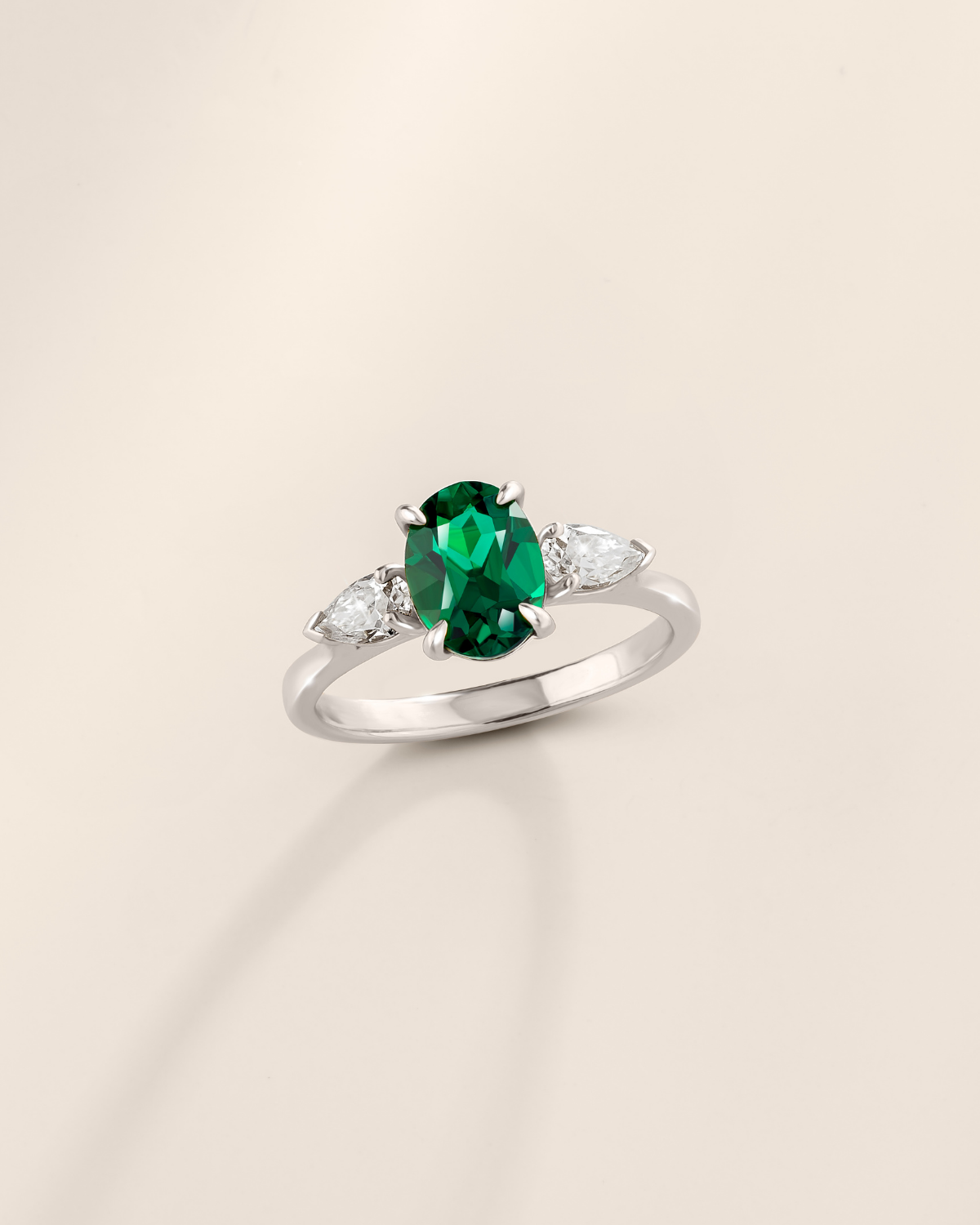 Emerald Oval Cut Three Stone Engagement Ring in Sterling Silver - SJR London Timepiece