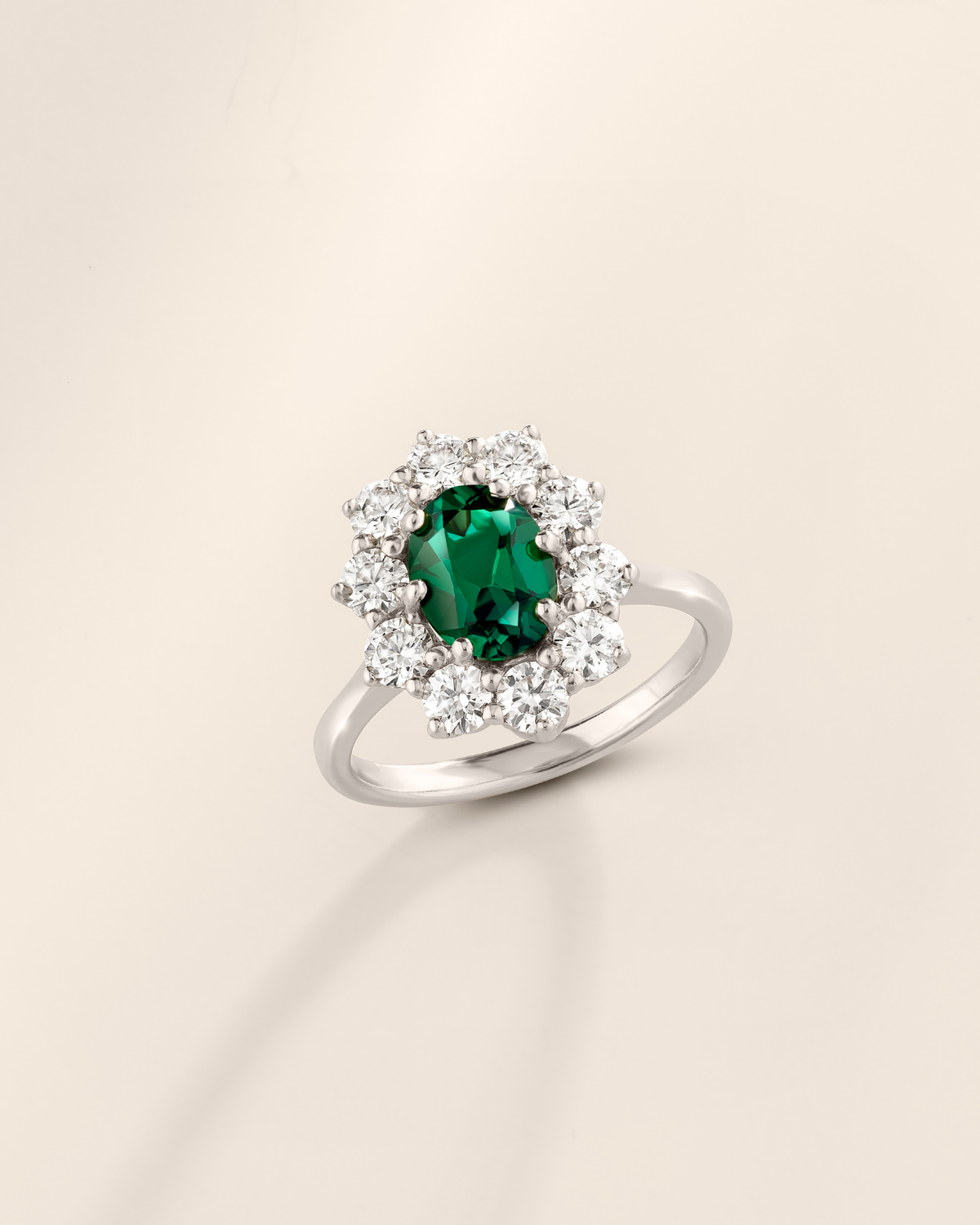 Bague de fiançailles auréole d'émeraudes en argent sterling