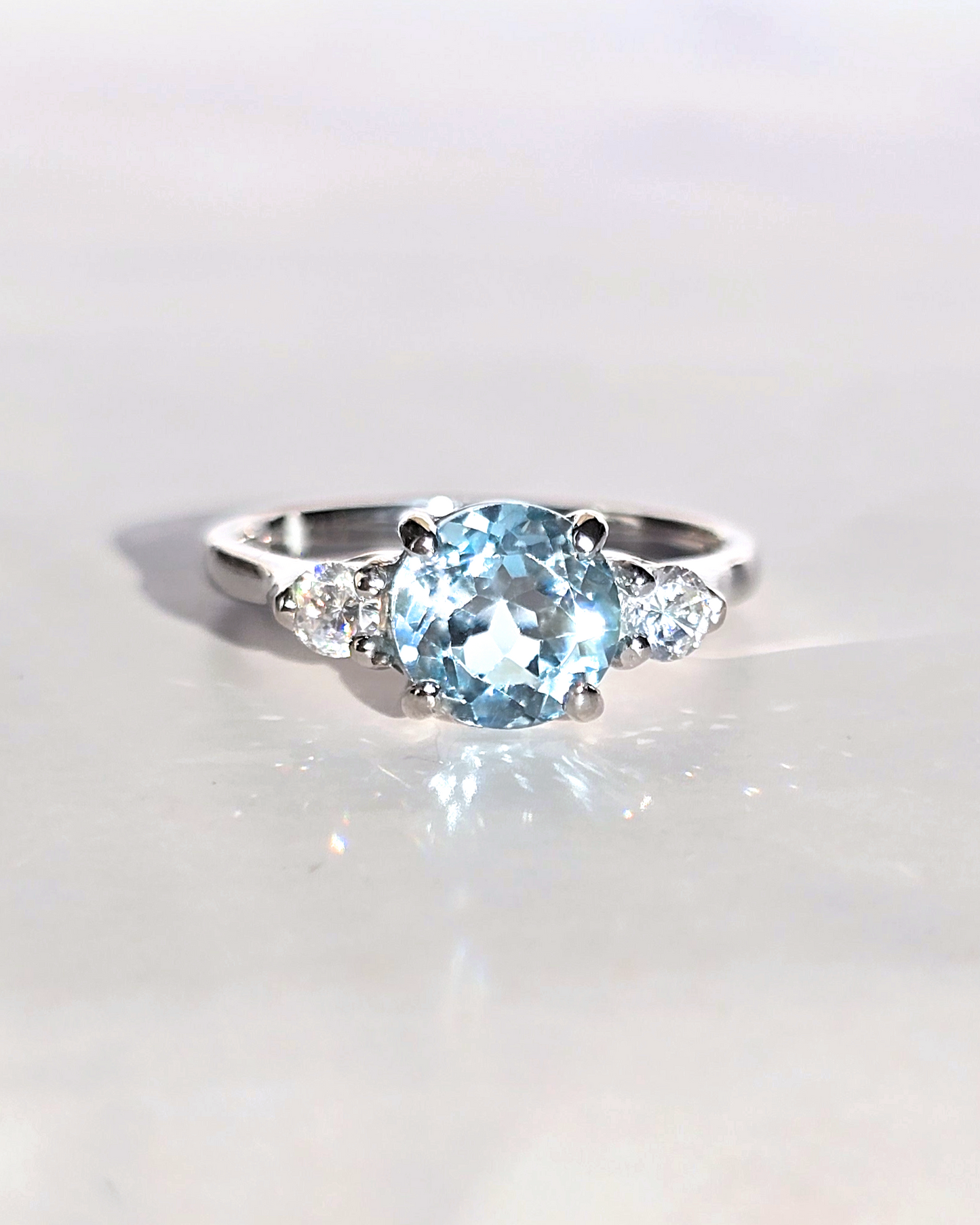 Blue Topaz Three Stone Ring in Sterling Silver - SJR London Timepiece