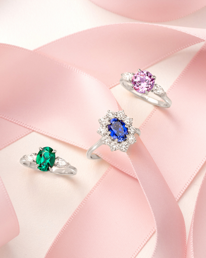 Emerald Oval Cut Three Stone Engagement Ring in Sterling Silver - SJR London Timepiece