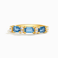 Bague éternité taille émeraude en topaze bleue de Londres en vermeil d'or 18 carats