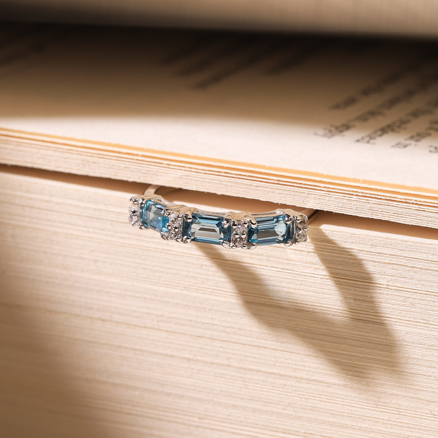 London Blue Topaz Emerald Cut Eternity Ring in Sterling Silver - SJR London Timepiece
