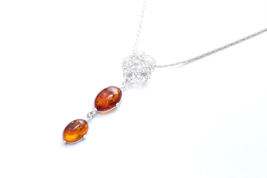 Collier Y à pendentif long en ambre