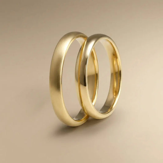 A 3mm gold wedding band featuring a classic lyra design in 9ct gold, displayed horizontally with a polished finish by Majesti
