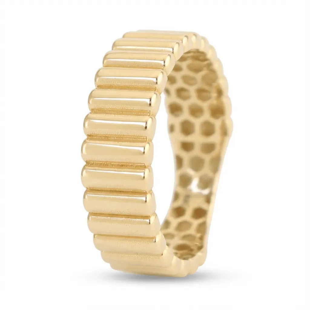 A solid gold ring with a ribbed texture in 14ct gold, shown as a modern wedding ring by Majestic Jewellery.