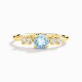 Bague à cinq pierres topaze bleu ciel en vermeil 18 carats