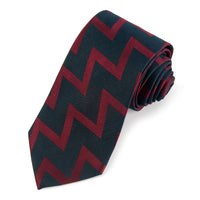 Royal Artillery Three-Fold Silk Tie in deep navy blue with gold trim, displayed flat on a white background, by Benson & Clegg