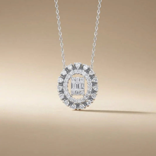 14ct white gold oval halo diamond pendant with baguette center 0.37ct by Majestic Jewellery