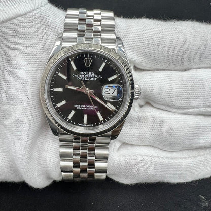 ROLEX DATEJUST A2027LW - SJR London Timepiece